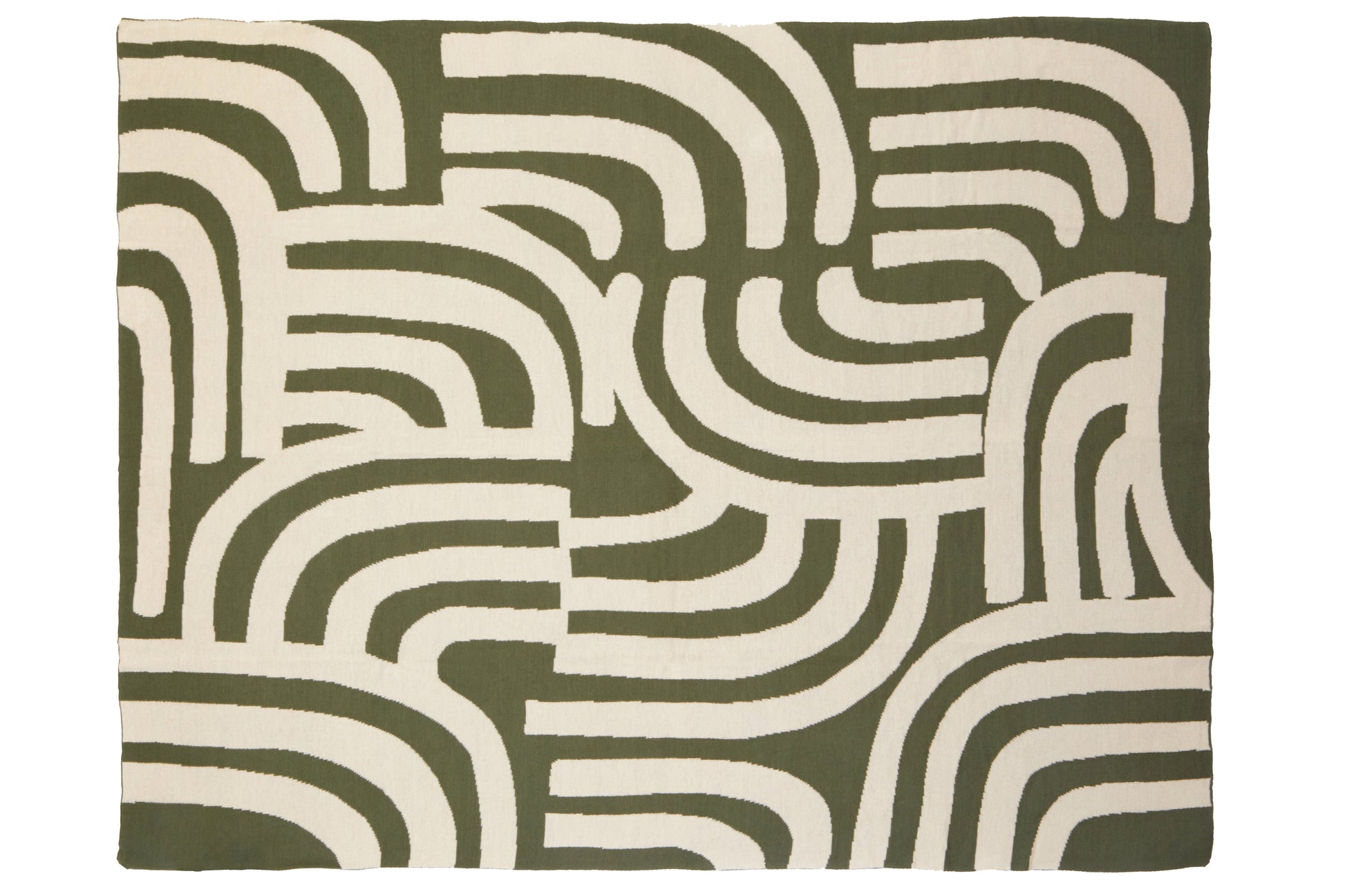 Rug with wavy pattern in green and white on a plain background