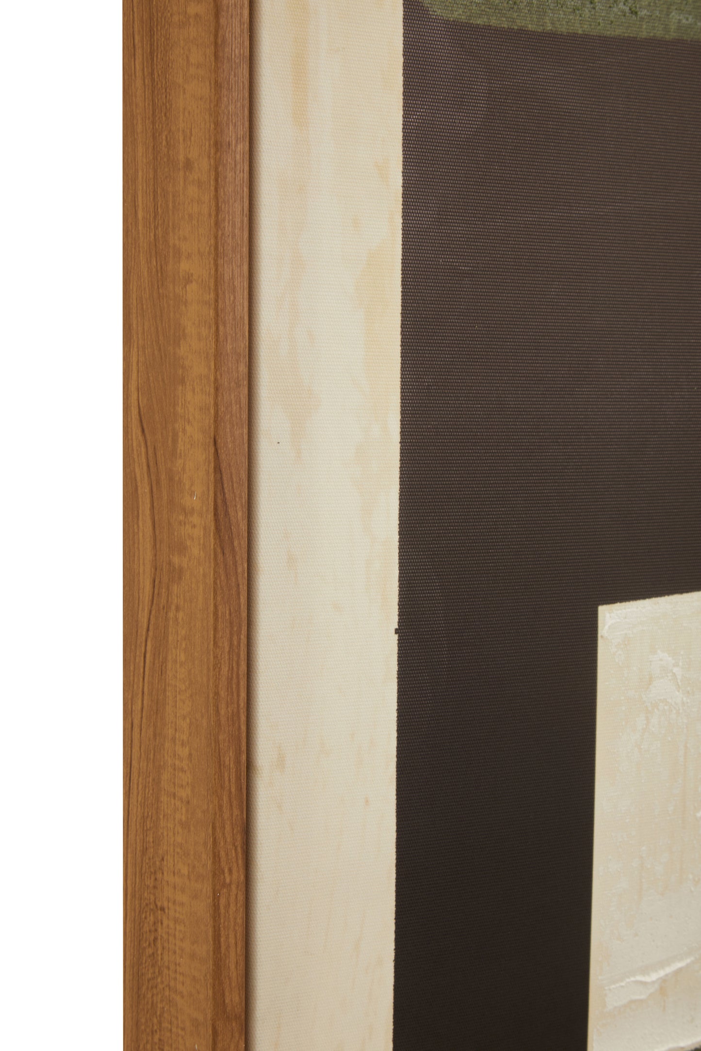 Close-up of a wooden frame with a textured wall background