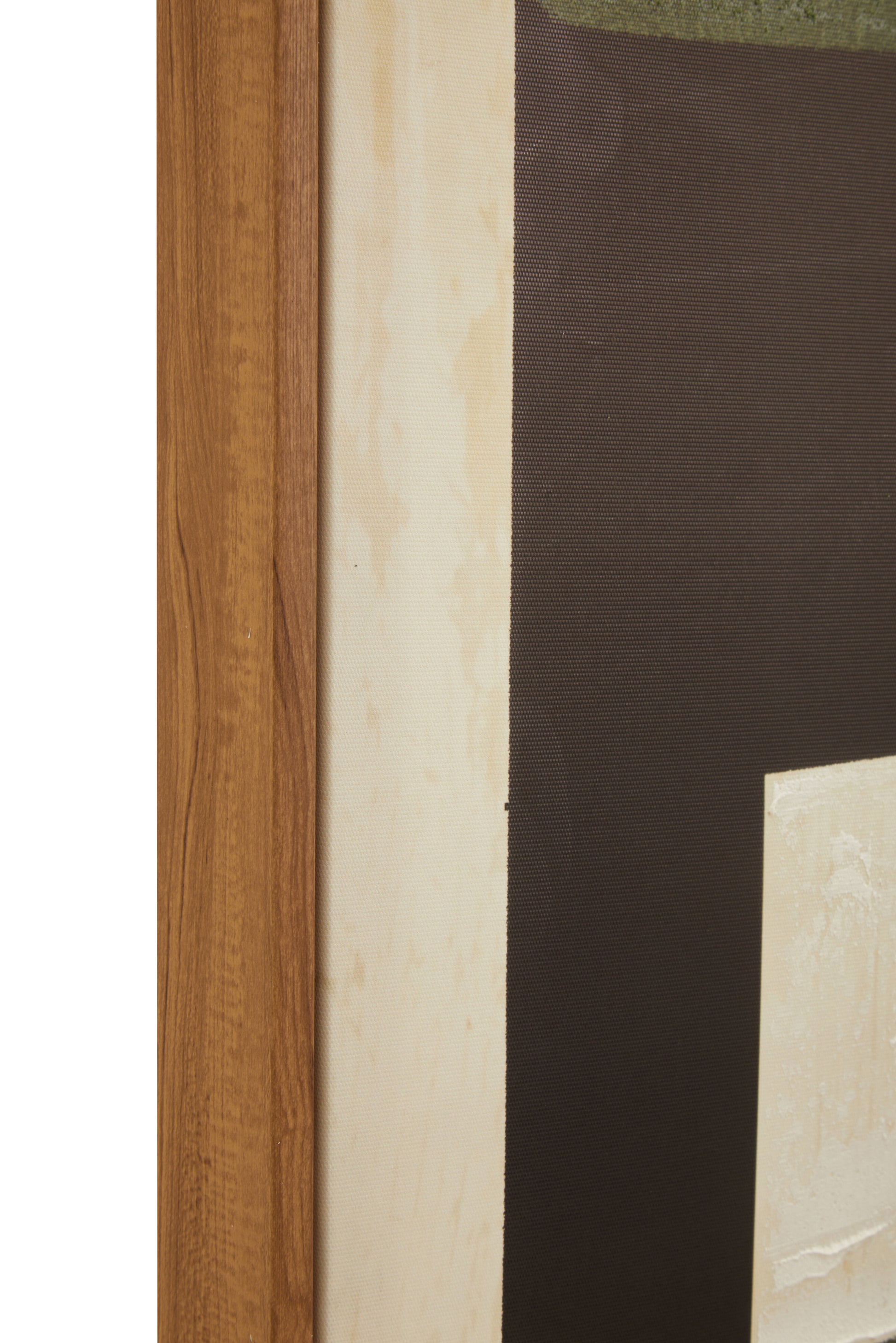 Close-up of a wooden frame with a textured wall background
