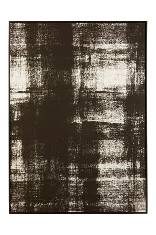 Abstract black and white patterned rug on a plain background