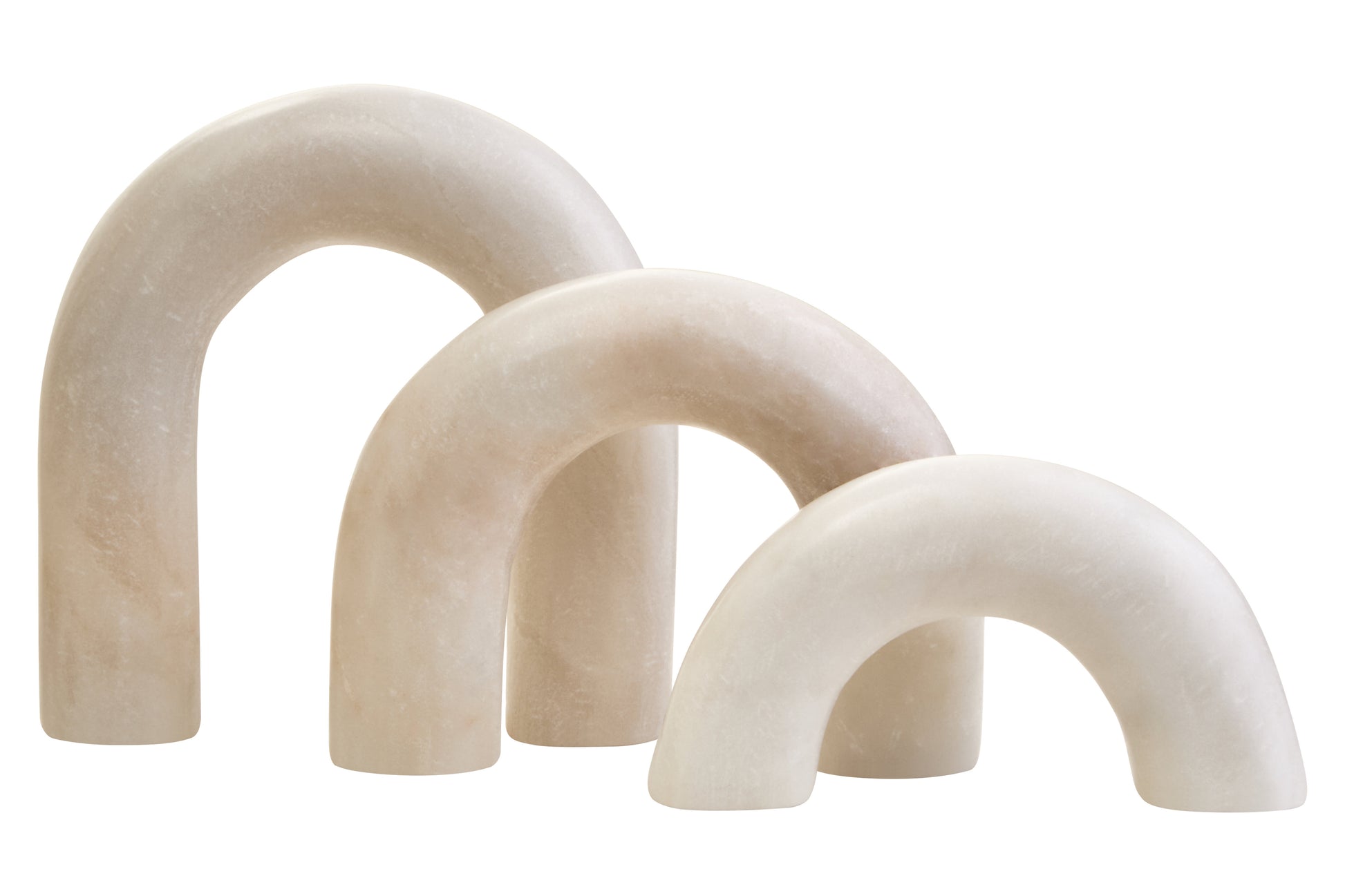 Set of three beige arch-shaped sculptures on a white background