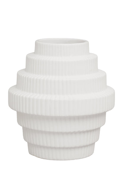 White ribbed vase on a white background