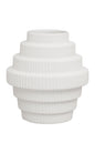 White ribbed vase on a white background