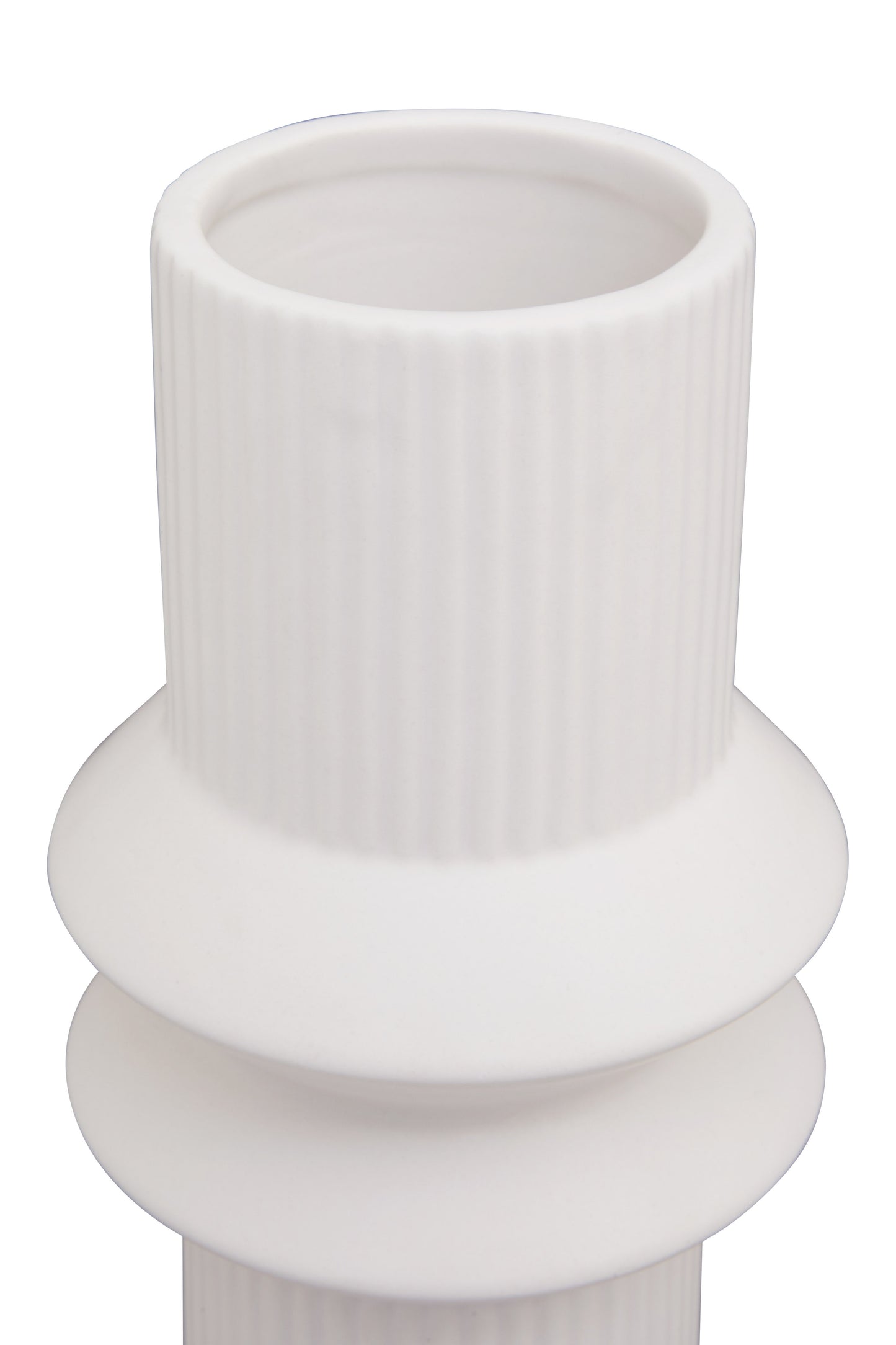 White ceramic vase with ribbed design on a white background