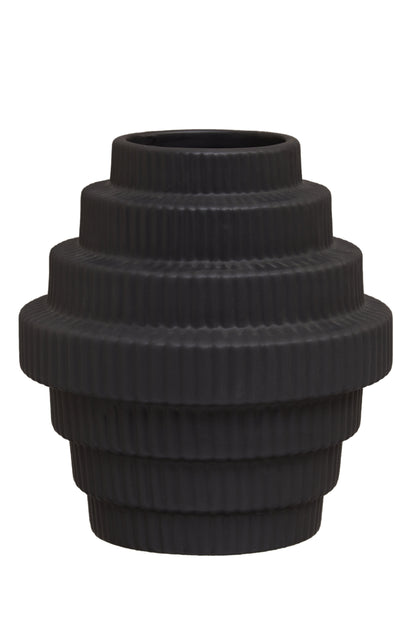 Black ribbed vase on a white background