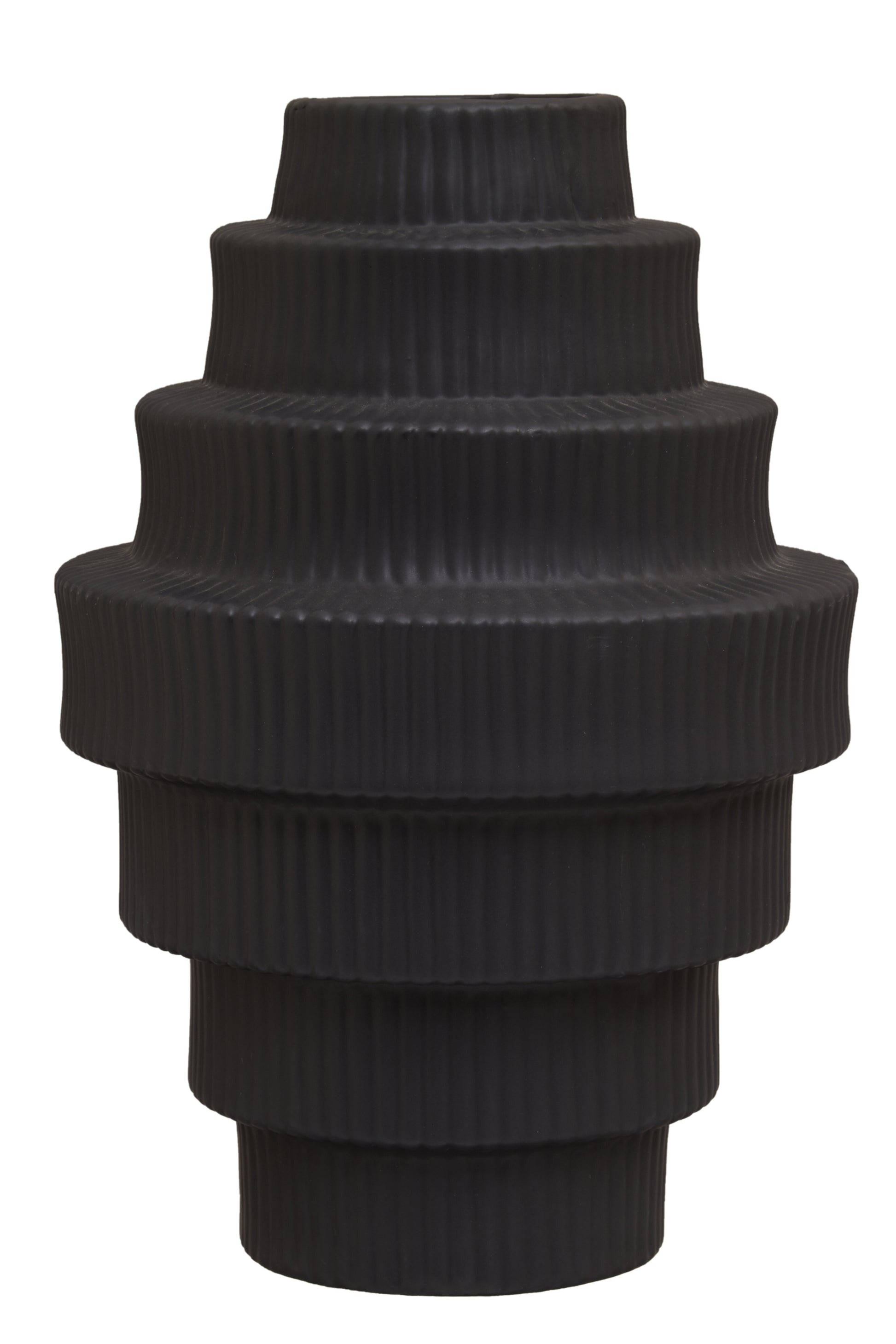 Stack of black ribbed vase on a white background