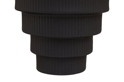 Black ribbed vase on a white background