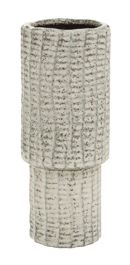 Textured ceramic vase on a white background