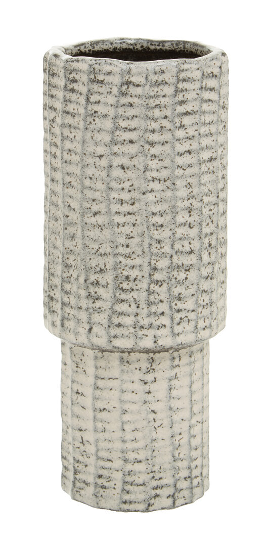 Textured ceramic vase on a white background
