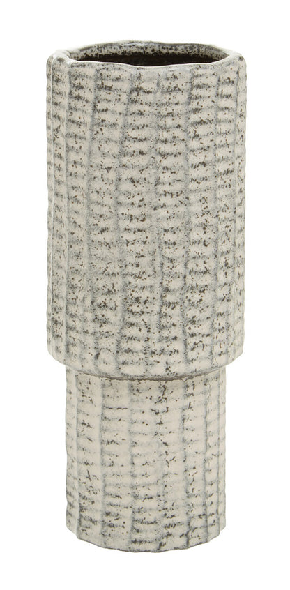 Textured ceramic vase on a white background