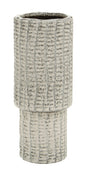 Textured ceramic vase on a white background