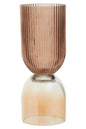 Glass vase with ribbed design and gradient color on a white background