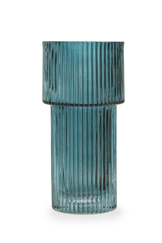 Blue ribbed glass vase on a white background