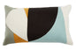 Colorful geometric pillow with abstract design on a white background