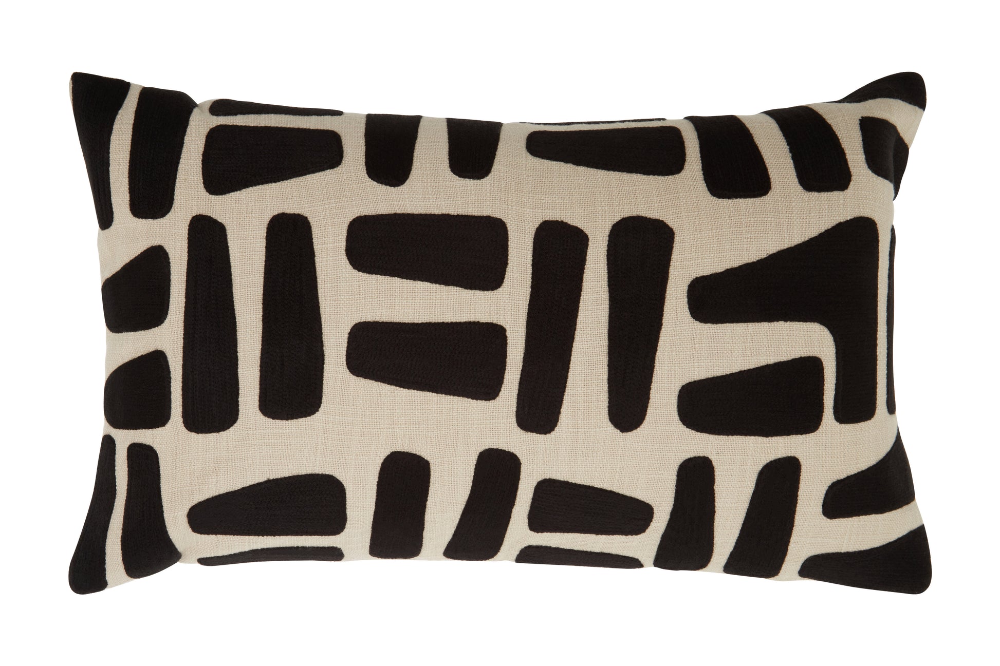 Decorative pillow with black abstract pattern on beige background