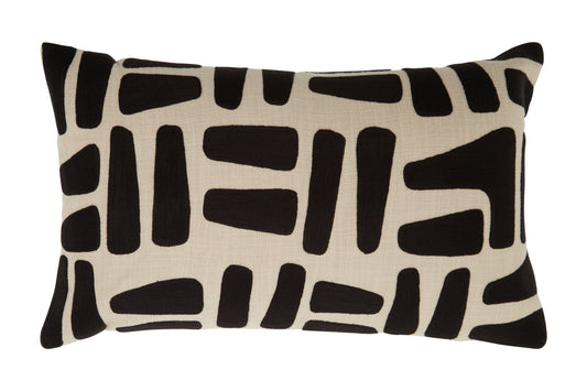 Decorative pillow with black abstract pattern on beige background