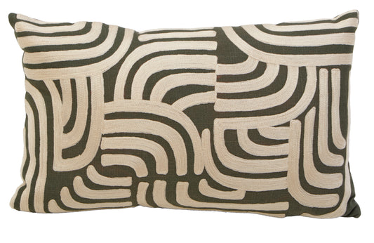 Decorative pillow with wavy pattern on a white background