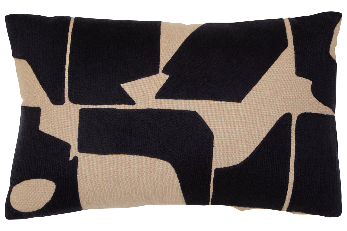 Decorative pillow with black and beige abstract pattern on a plain background