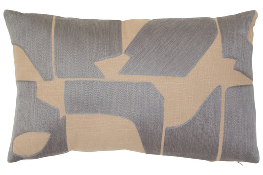 Decorative pillow with geometric pattern in gray and beige on a plain background