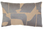 Decorative pillow with geometric pattern in gray and beige on a plain background