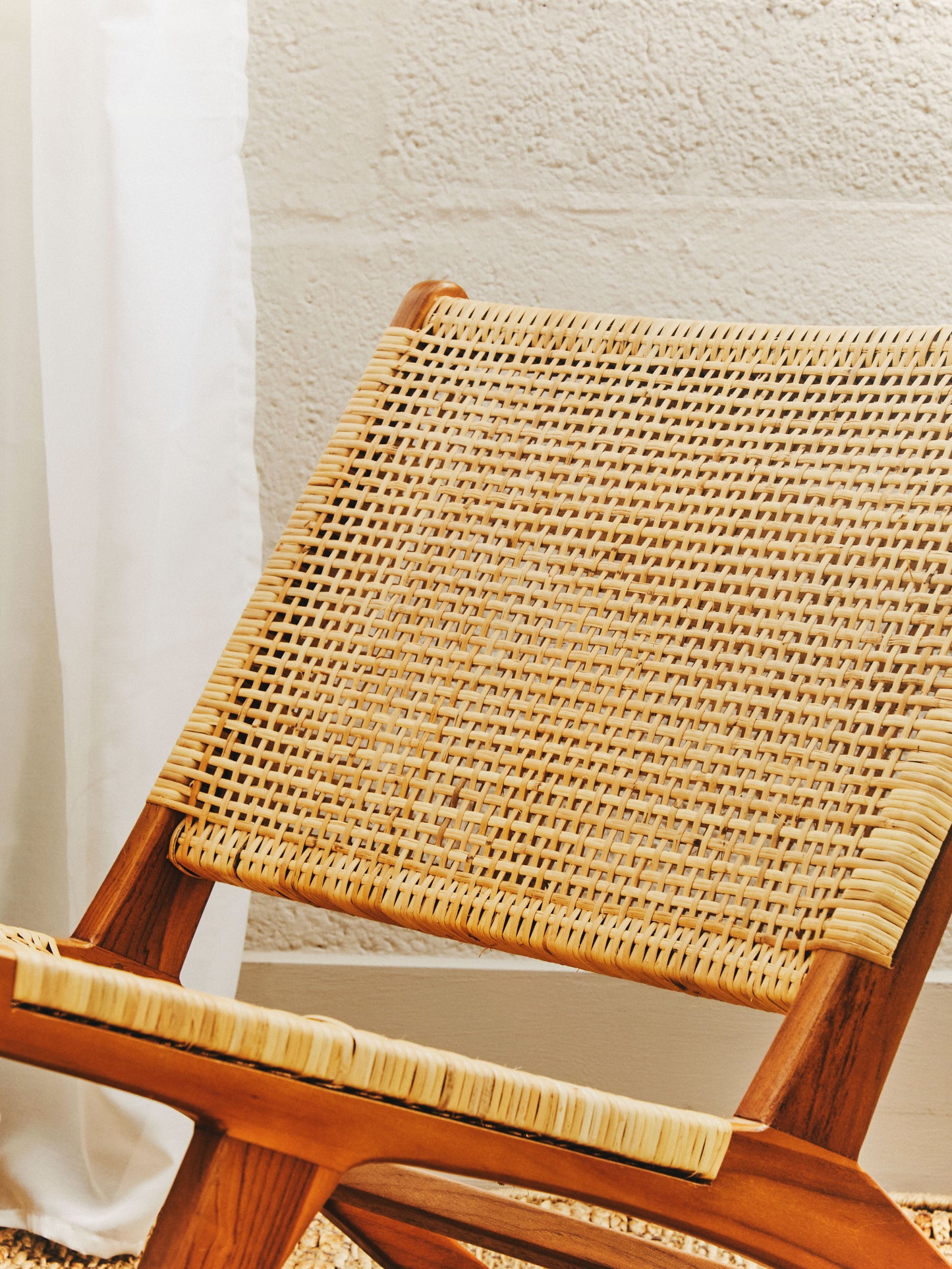 RUNE TEAK WOOD AND NATURAL RATTAN LOUNGE CHAIR